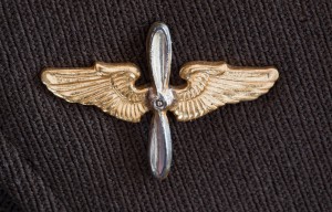 1940s World War II gold insignia pin (airplane propeller and win
