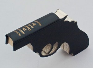 gun-inside-book-catcher-in-the-rye-480x352